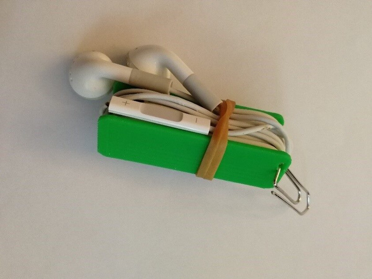 1. Kopfhörerkabel aufwickeln